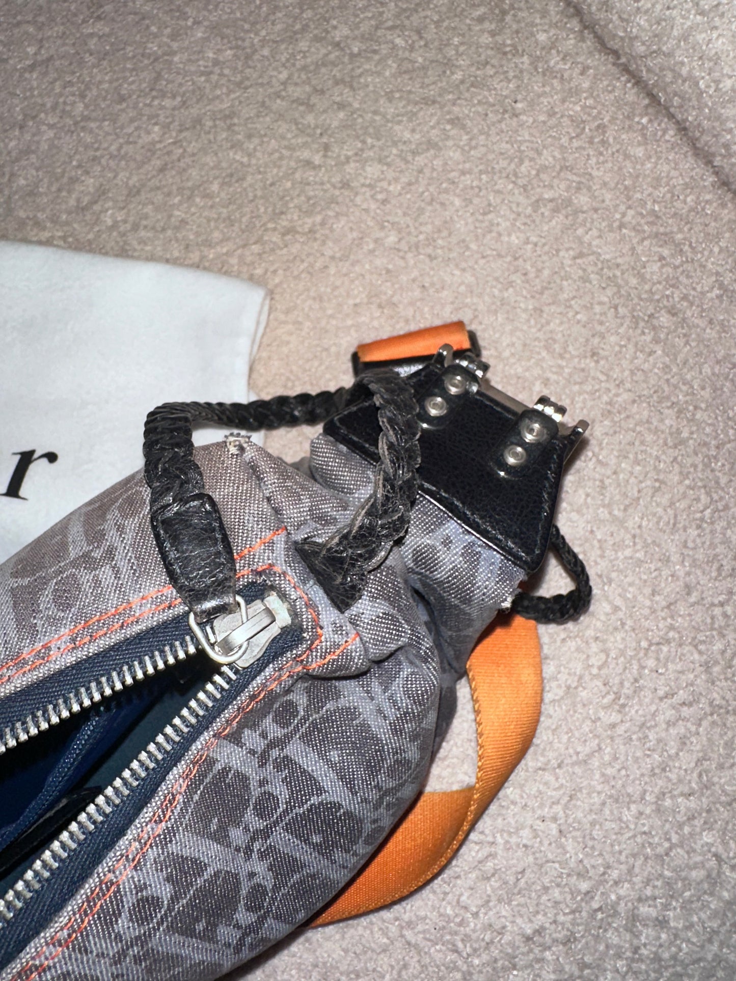 Dior by John Galliano “Remove before flight” Oblique Shoulder Bag