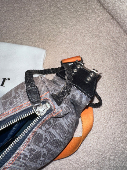 Dior by John Galliano “Remove before flight” Oblique Shoulder Bag
