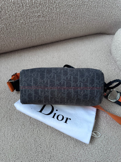 Dior by John Galliano “Remove before flight” Oblique Shoulder Bag