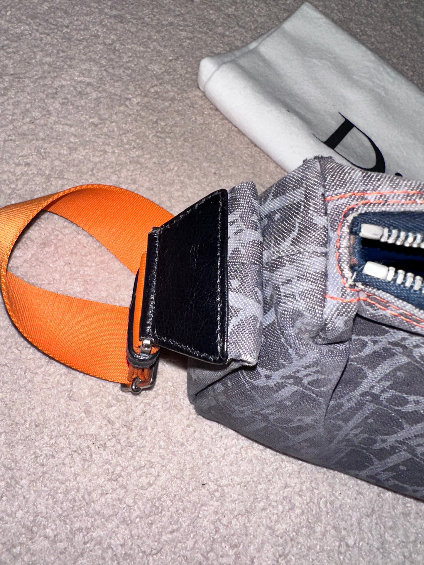 Dior by John Galliano “Remove before flight” Oblique Shoulder Bag