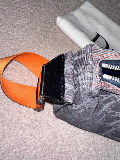 Dior by John Galliano “Remove before flight” Oblique Shoulder Bag