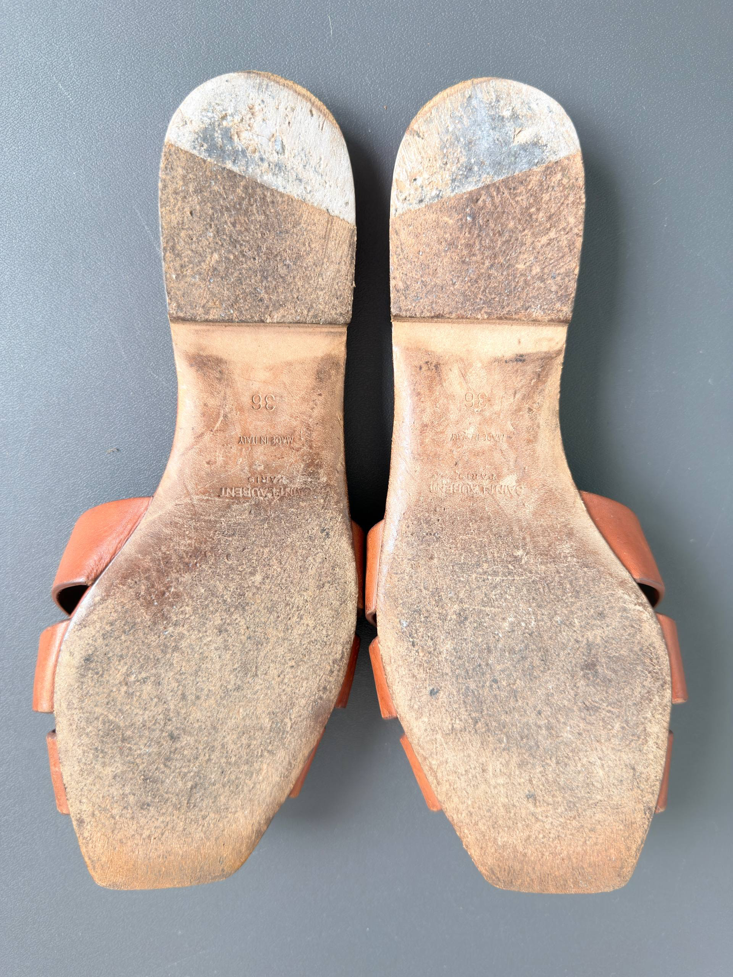Yves Saint Laurent Tribute Mules in Smooth Leather Amber